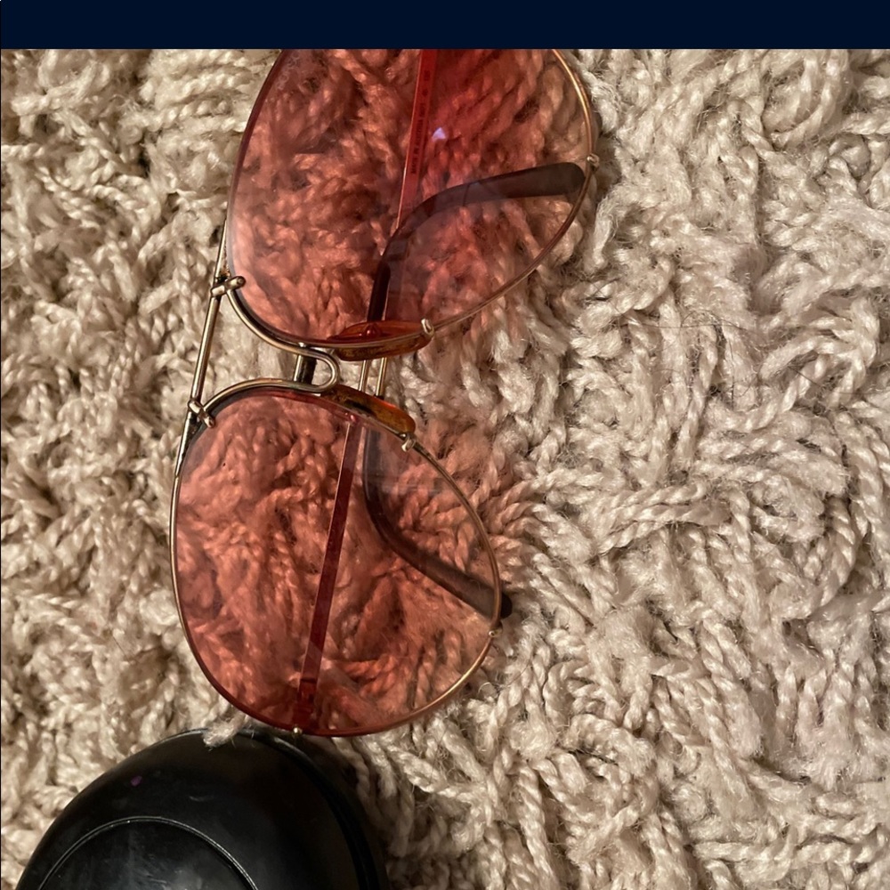 Rose gold and black Porsche Carrera sunglasses